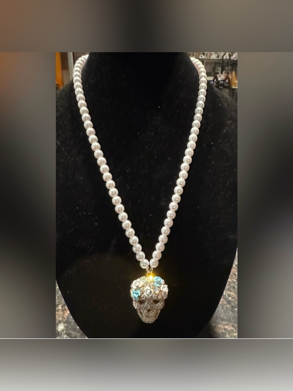 Pearl Bead Necklace with Crystal Skull Pendant and Blue Accent Flowers